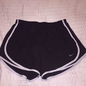 black NIKE track shorts